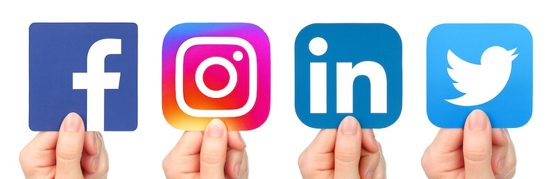 Social media icons being held